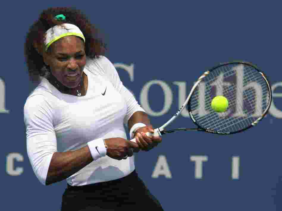 Serena Williams returns a shot during a match at the Western & Southern Open tennis tournament in Mason, Ohio.