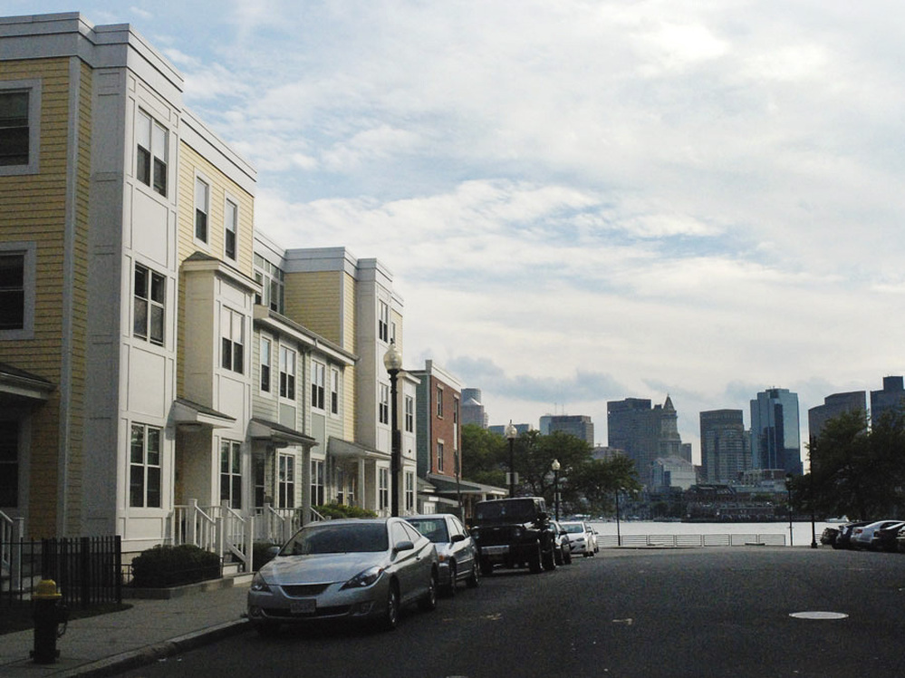 Some residents in this waterside housing development in East Boston say they would like more guidance from the city on how to plan for future flooding.