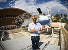 Roger Angel, an astronomer at the University of Arizona, stands in front of his new project: a solar tracker. Angel wants to use the device to harness Arizona's abundant sunlight and turn it into usable energy. Roger Angel, an astronomer at the University of Arizona, stands in front of his new project: a solar tracker. Angel wants to use the device to harness Arizona's abundant sunlight and turn it into usable energy.