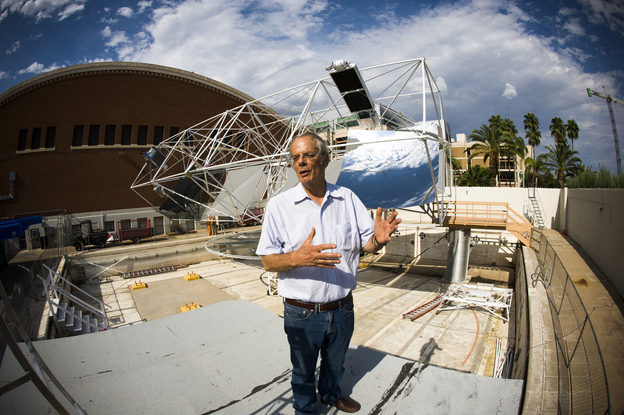 Roger Angel, an astronomer at the University of Arizona, stands in front of his new project: a solar tracker. Angel wants to use the device to harness Arizona's abundant sunlight and turn it into usable energy.