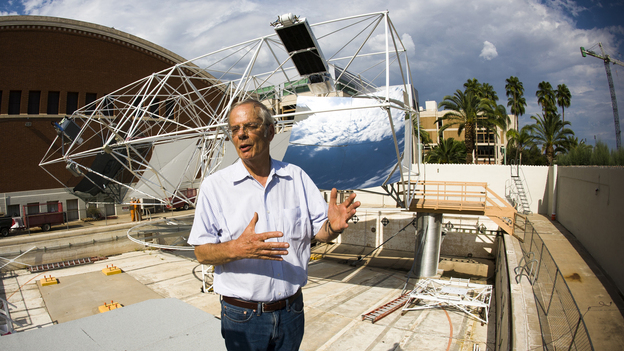 Roger Angel, an astronomer at the University of Arizona, stands in front of his new project: a solar tracker. Angel wants to use the device to harness Arizona's abundant sunlight and turn it into usable energy. Roger Angel, an astronomer at the University of Arizona, stands in front of his new project: a solar tracker. Angel wants to use the device to harness Arizona's abundant sunlight and turn it into usable energy.