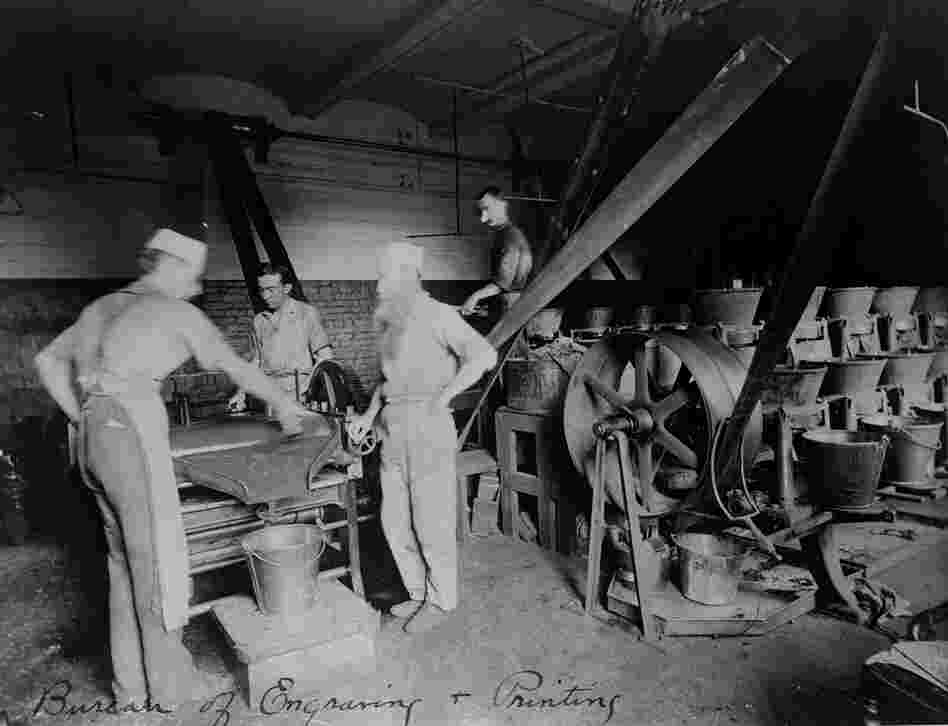 Workers grind a non-removable, green ink into the right viscosity for the presses, circa 1890. Green became the standard color because it made bills harder to alter or counterfeit. Workers grind a non-removable, green ink into the right viscosity for the presses, circa 1890. Green became the standard color because it made bills harder to alter or counterfeit.