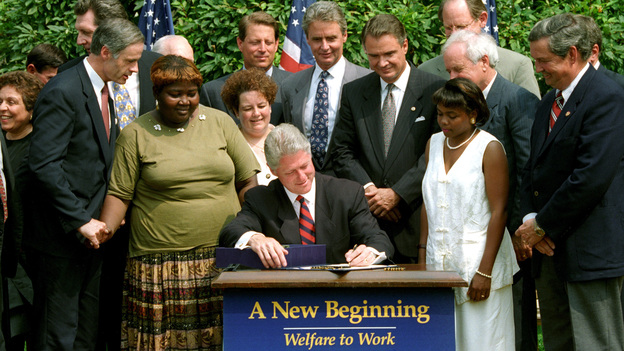 President Clinton signs the welfare reform law on Aug. 22, 1996. (Reuters /Landov)