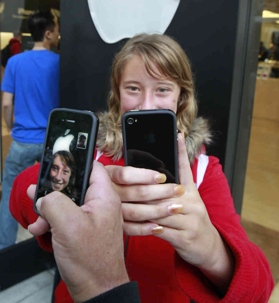 Emilie Weideman and her father, Marc Weideman, of Fremont, Calif., use FaceTime after purchasing the new device in June 2010.