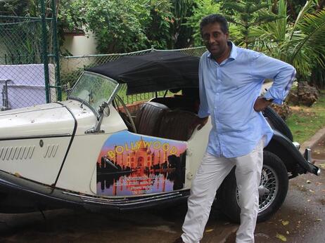 Cuba has tight advertising restrictions, so Cedric Fernando uses his British-made 1955 MG convertible to spread the word about his Indian restaurant, Bollywood, in Havana. Cuba has tight advertising restrictions, so Cedric Fernando uses his British-made 1955 MG convertible to spread the word about his Indian restaurant, Bollywood, in Havana.