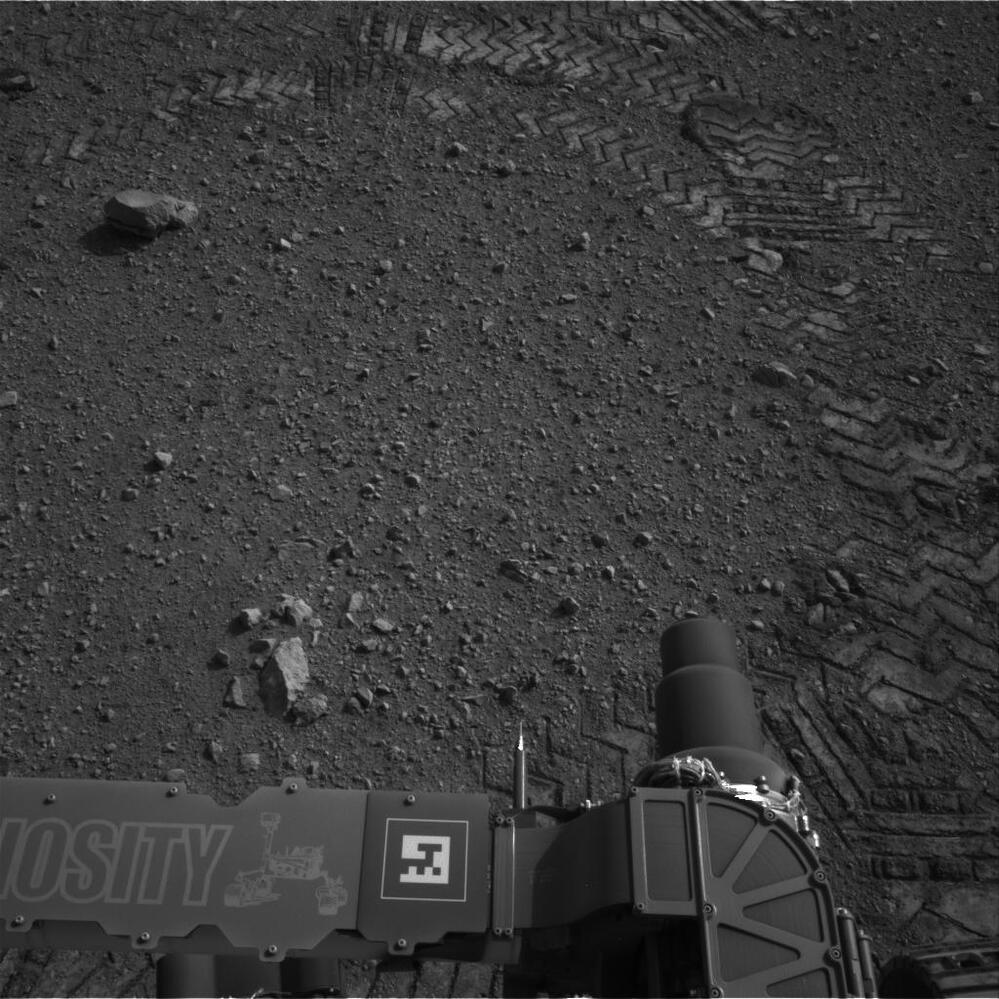 Those tracks to the top and right were made by Curiosity as it moved today.
