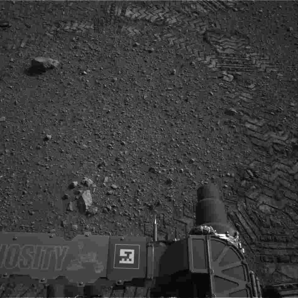 Those tracks to the top and right were made by Curiosity as it moved today.