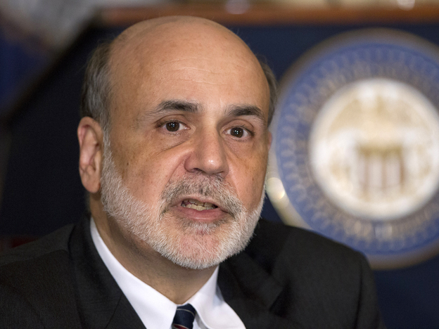 Federal Reserve Chairman Ben Bernanke talks to educators Aug. 7 in Washington, D.C. At their most recent meeting, many Fed members backed action to boost the economy.