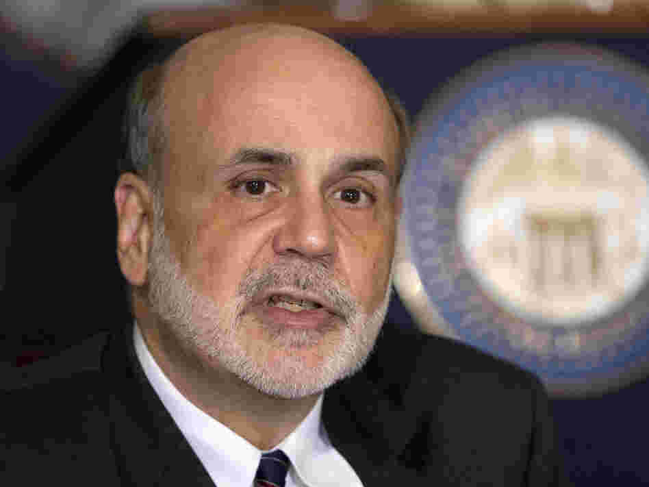Federal Reserve Chairman Ben Bernanke talks to educators Aug. 7 in Washington, D.C. At their most recent meeting, many Fed members backed action to boost the economy.
