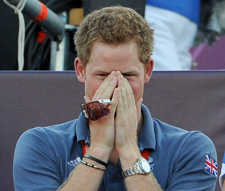 Prince Harry, fully clothed, watching a beach volleyball match at the Olympic Games in London on Aug. 8. Prince Harry, fully clothed, watching a beach volleyball match at the Olympic Games in London on Aug. 8.