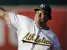 Oakland Athletics pitcher Bartolo Colon works against the Cleveland Indians in the first inning of a baseball game Aug. 18, 2012, in Oakland. Oakland Athletics pitcher Bartolo Colon works against the Cleveland Indians in the first inning of a baseball game Aug. 18, 2012, in Oakland.