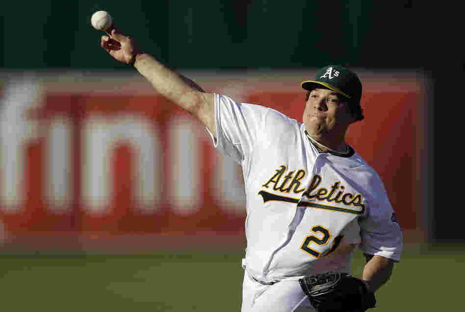Oakland Athletics pitcher Bartolo Colon works against the Cleveland Indians in the first inning of a baseball game Aug. 18, 2012, in Oakland.