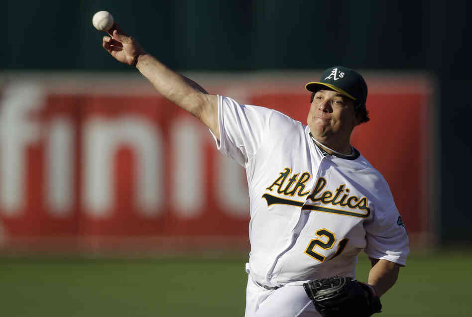 Oakland Athletics pitcher Bartolo Colon works against the Cleveland Indians in the first inning of a baseball game Aug. 18, 2012, in Oakland.