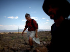 Craig Allen, left, a research ecologist with the U.S. Geological Survey, and Jorge Castro, a visiting professor of ecology from Spain, survey a plateau ravaged during last year's Las Conchas fire in New Mexico. The megafire burned over 150,000 acres of forest. Craig Allen, left, a research ecologist with the U.S. Geological Survey, and Jorge Castro, a visiting professor of ecology from Spain, survey a plateau ravaged during last year's Las Conchas fire in New Mexico. The megafire burned over 150,000 acres of forest.
