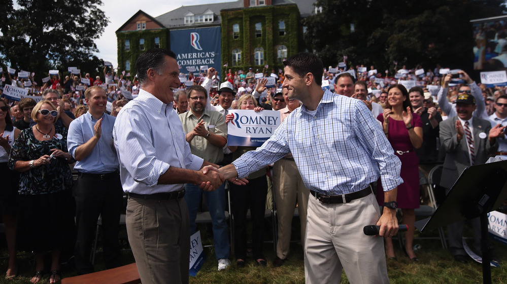 Republican presidential candidate Mitt Romney, left, shakes hands with his choice for running mate, Rep. Paul Ryan of Wisconsin, Monday in  in Manchester, N.H.