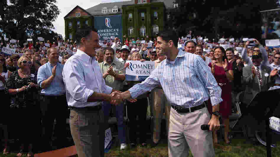 Republican presidential candidate Mitt Romney, left, shakes hands with his choice for running mate, Rep. Paul Ryan of Wisconsin, Monday in  in Manchester, N.H.