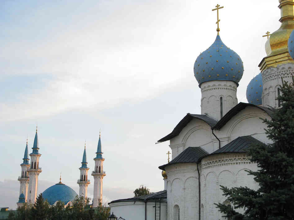 The domes of a Russian Orthodox church (right) share the skyline of Kazan, Tatarstan's capital, with the minarets of a Muslim mosque, a reminder of the city's history of peaceful coexistence between Christians and Muslims.