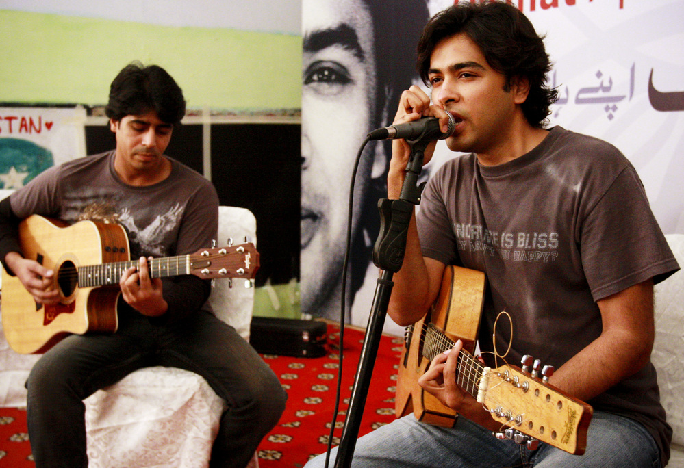 Pakistani pop singer Shehzad Roy (right) sings for teenage prisoners at a prison in Karachi, Pakistan, in 2008. Known originally for fluffy pop songs, Roy's music has taken a harder, more political edge, protesting injustice in Pakistan.