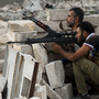 The daily fighting in Syria included this gun battle Wednesday involving rebels in the northern city of Aleppo. Still, the rival sides recently worked out a prisoner swap in which two women were freed from state custody, while the rebels released seven pro-government fighters.