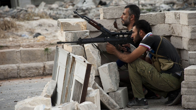 The daily fighting in Syria included this gun battle Wednesday involving rebels in the northern city of Aleppo. Still, the rival sides recently worked out a prisoner swap in which two women were freed from state custody, while the rebels released seven pro-government fighters. The daily fighting in Syria included this gun battle Wednesday involving rebels in the northern city of Aleppo. Still, the rival sides recently worked out a prisoner swap in which two women were freed from state custody, while the rebels released seven pro-government fighters.