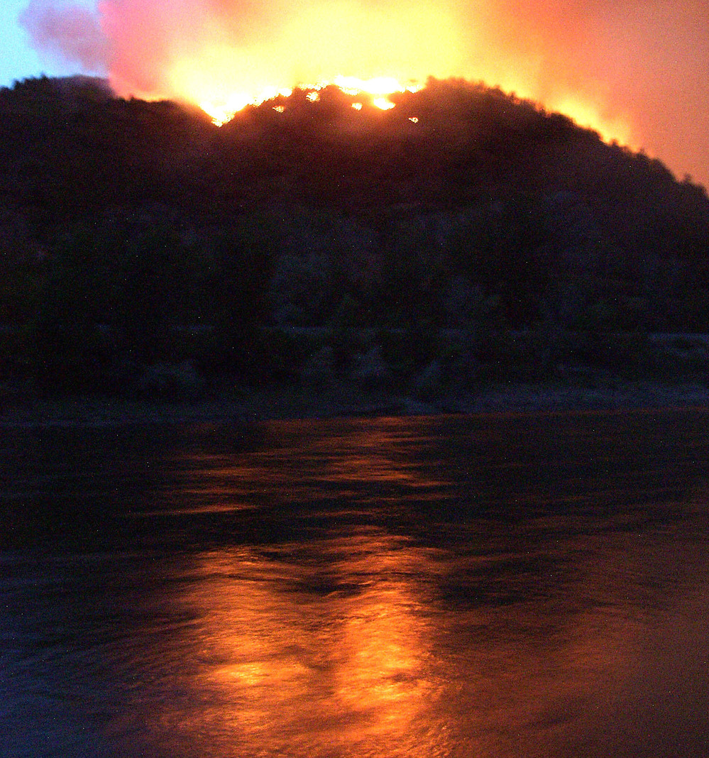 A photograph from June 8, 2002 shows flames from the Hayman wildfire, which burned in in the Rocky Mountains southwest of Denver.