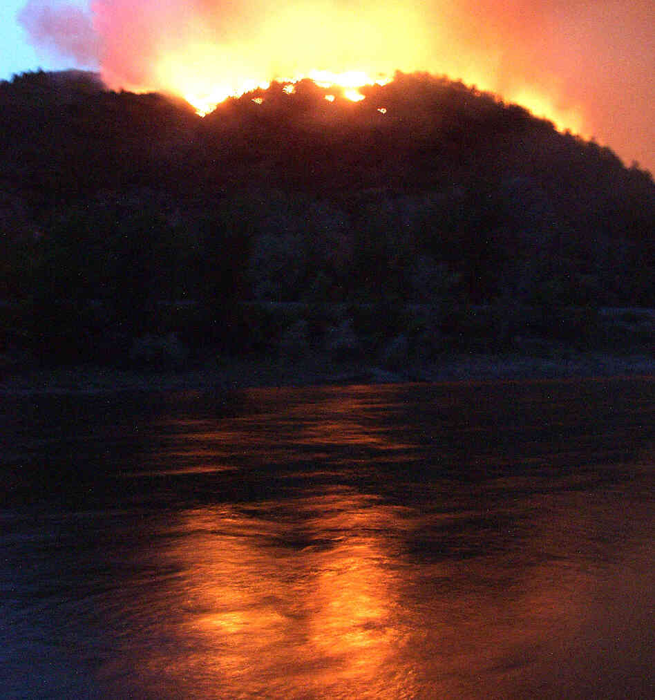 A photograph from June 8, 2002 shows flames from the Hayman wildfire, which burned in in the Rocky Mountains southwest of Denver.
