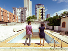 Joao (Gustavo Jahn) and Sofia (Irma Brown) are among the inhabitants of the Recife, Brazil, street where Neighboring Sounds takes place. Joao (Gustavo Jahn) and Sofia (Irma Brown) are among the inhabitants of the Recife, Brazil, street where Neighboring Sounds takes place.