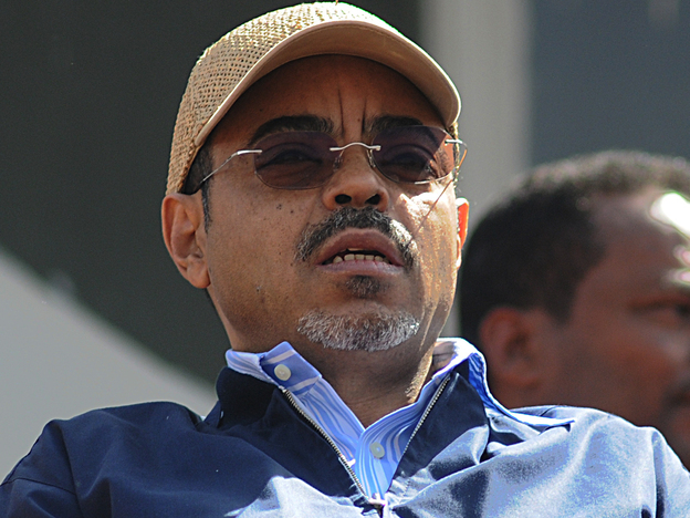 Ethiopian Prime Minister Meles Zenawi follows proceedings at the Meskel Square in Addis Ababa on May 25, 2010 to celebrate his landslide election victory.