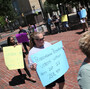Protesters hold signs in Allentown, Pa., om July 25 as the Commonwealth Court holds hearings on voter ID laws. Protesters hold signs in Allentown, Pa., om July 25 as the Commonwealth Court holds hearings on voter ID laws.