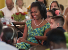 First lady Michelle Obama sits with guests as they eat lunch during a kids' state dinner at the White House on Monday. First lady Michelle Obama sits with guests as they eat lunch during a kids' state dinner at the White House on Monday.