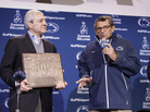 Then-Penn State President Graham Spanier and then-head football coach Joe Paterno last fall, before the Jerry Sandusky scandal cost them both their jobs. Then-Penn State President Graham Spanier and then-head football coach Joe Paterno last fall, before the Jerry Sandusky scandal cost them both their jobs.