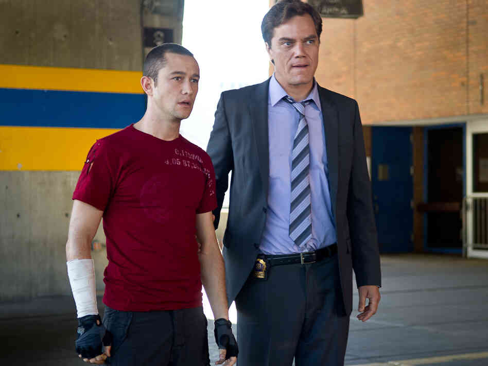 Officer Bobby Monday (Michael Shannon) is interested in what Wilee is carrying.