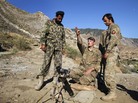 Spc. Ben Purvis (center) helps train Afghan troops on how to use mortars in the eastern province of Kunar in June. The top U.S. commander in Afghanistan, Gen. John Allen, points to several factors in the rise of "insider attacks" on American forces. He says relations between U.S. and Afghan troops are good overall. Spc. Ben Purvis (center) helps train Afghan troops on how to use mortars in the eastern province of Kunar in June. The top U.S. commander in Afghanistan, Gen. John Allen, points to several factors in the rise of "insider attacks" on American forces. He says relations between U.S. and Afghan troops are good overall.