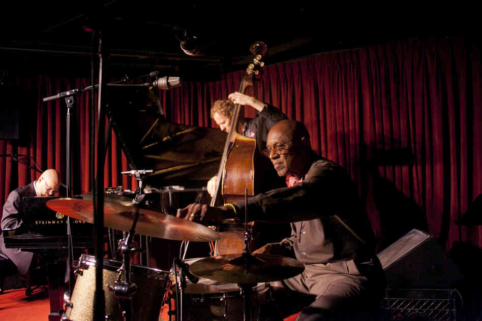 The trio of Albert "Tootie" Heath (drums), Ben Street (bass) and Ethan Iverson (piano) perform at the Village Vanguard.