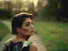 Jessie Ware, in a still from the video for her song, "110%."