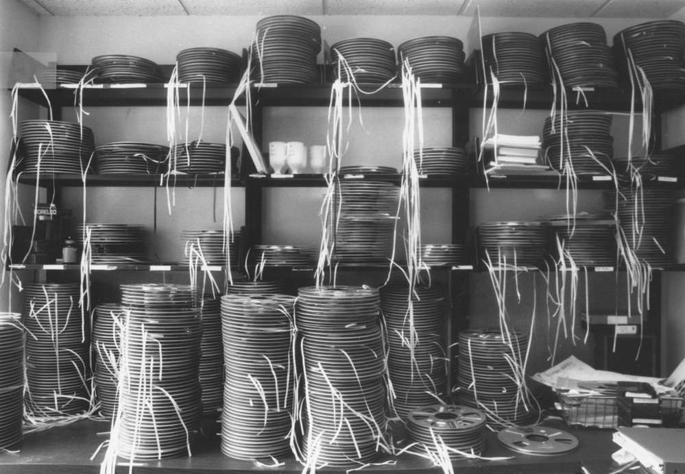 Mountains of exhausted-looking audio tapes, replete with white leader tapes to help engineers thread them onto tape recorders.