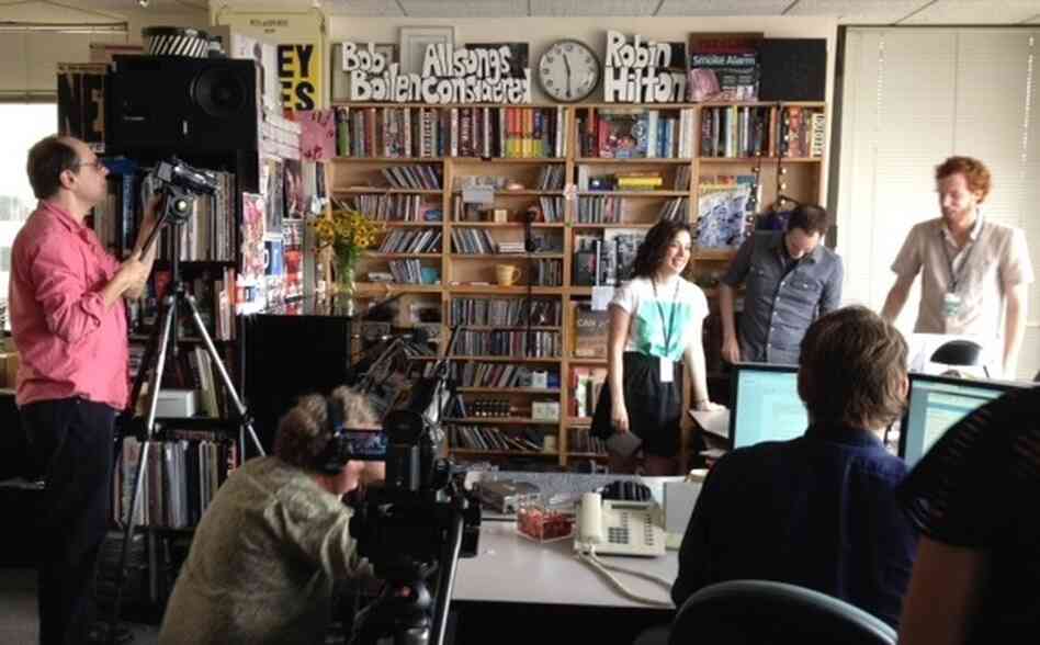 The NPR Music crew setting the "stage" for the show. Not normally present is the strategically arranged upright piano against Bob Boilen's bookshelf. The NPR Music crew setting the "stage" for the show. Not normally present is the strategically arranged upright piano against Bob Boilen's bookshelf.