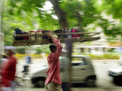 Dabba wallahs carry lunchboxes to offices in Indian cities. But the old tradition is changing with modern times. Dabba wallahs carry lunchboxes to offices in Indian cities. But the old tradition is changing with modern times.