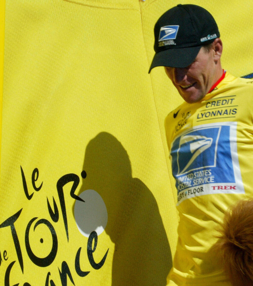 Lance Armstrong, wearing the yellow jersey that identifies the leader in the Tour de France, during the race in 2003. He won that year and six other times.