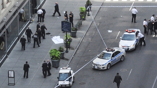 Police investigate a shooting at the Empire State Building in New York on Friday. (AP)