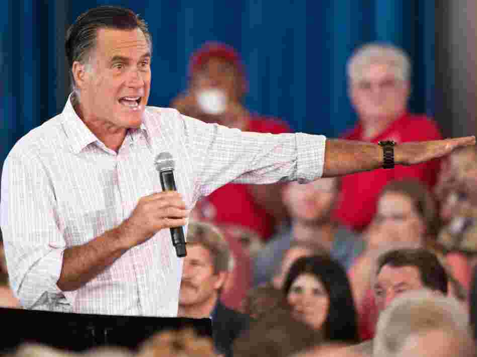 Republican presidential candidate Mitt Romney speaks at a town hall meeting in Grand Junction, Colo., on July 10. Romney says he wants to sharply cut income tax rates, but that those cuts would be revenue-neutral.