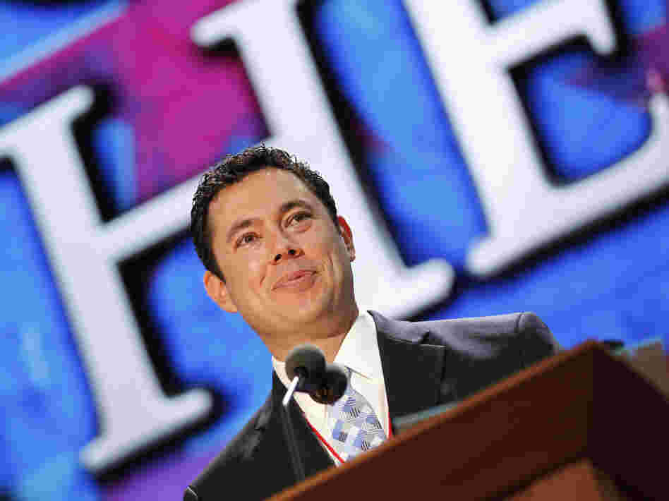 Utah Rep. Jason Chaffetz stands on the stage Saturday during preparation for the convention.