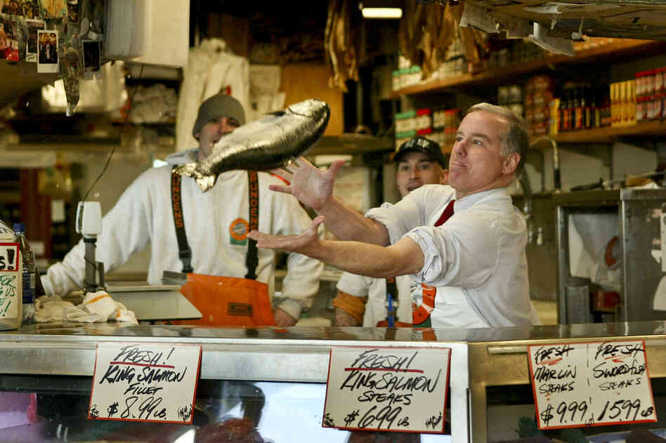 Then-Democratic presidential candidate Howard Dean was tossed a king salmon during a campaign swing through Pike Place Market in Seattle in 2004.
