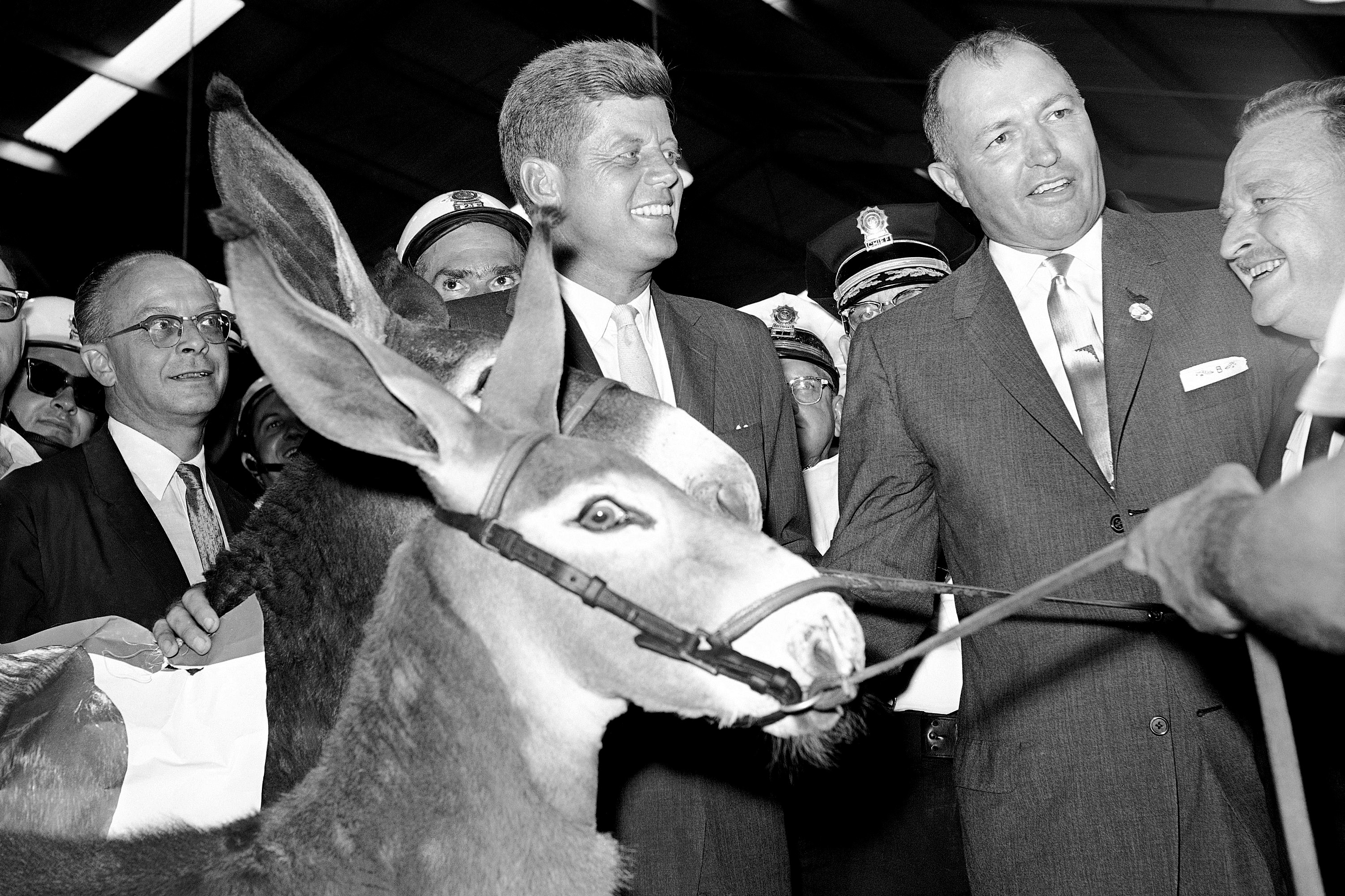 During his 1960 campaign, Sen. John F. Kennedy, accompanied by Tennessee Gov. Buford Ellington (right), made friends with a couple of Democratic donkeys in Nashville. Moments later, as the presidential candidate addressed a packed State Fair crowd, the donkey closest to Kennedy began to bray. Kennedy didn't seem to notice.