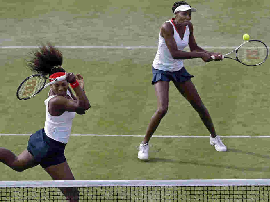Serena Williams, left, and Venus Williams compete in Wimbledon at the 2012 Summer Olympics.