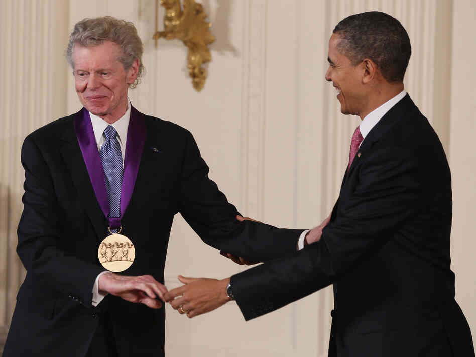 President Obama congratulates pianist Van Cliburn after presenting him with the National Medal of Arts in 2011.