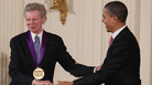 President Obama congratulates pianist Van Cliburn after presenting him with the National Medal of Arts in 2011. President Obama congratulates pianist Van Cliburn after presenting him with the National Medal of Arts in 2011.