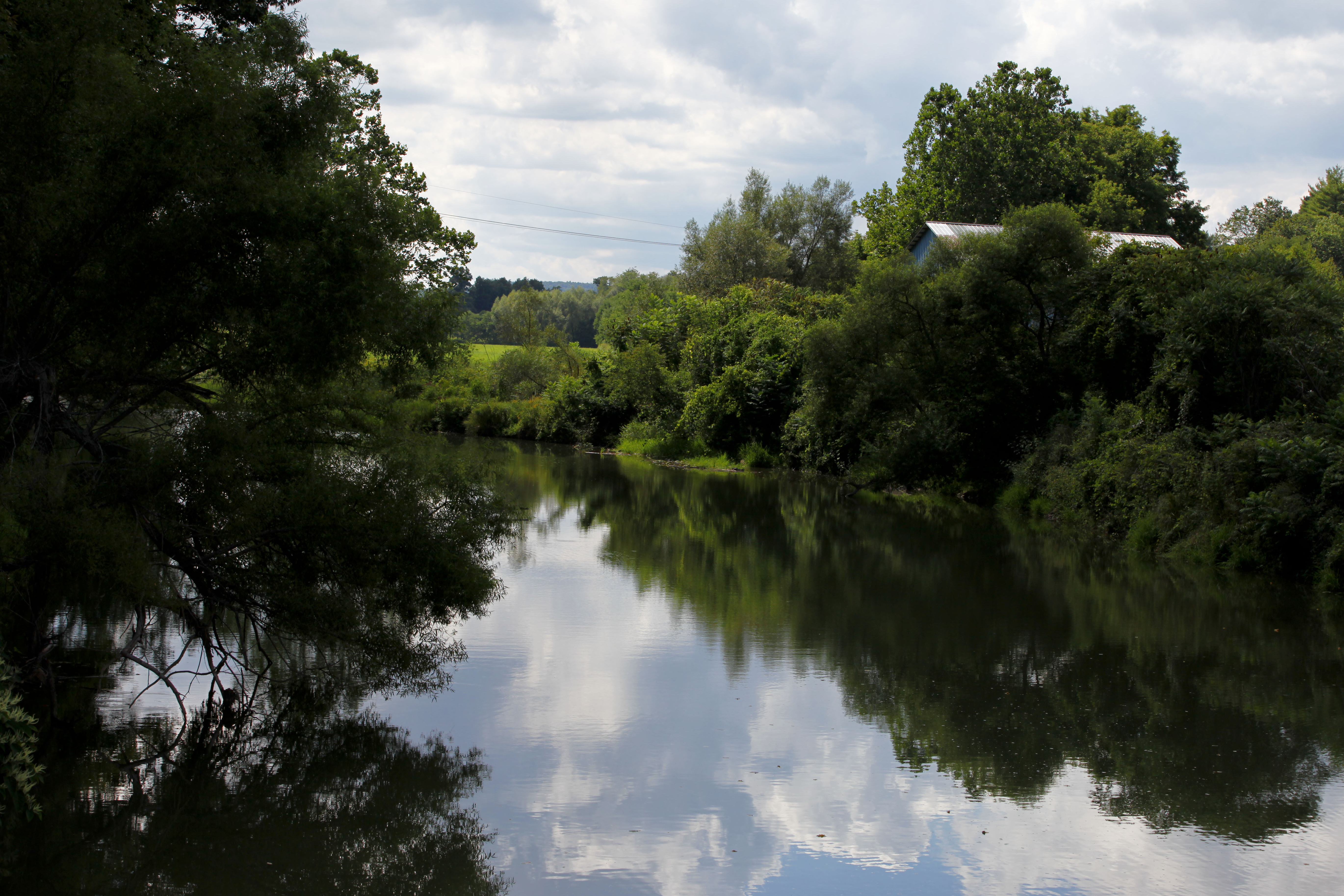 A local well pad in Bradford County has been leaking gas since mid-May, according to state regulators. Gas has been bubbling into this nearby creek since about the same time.