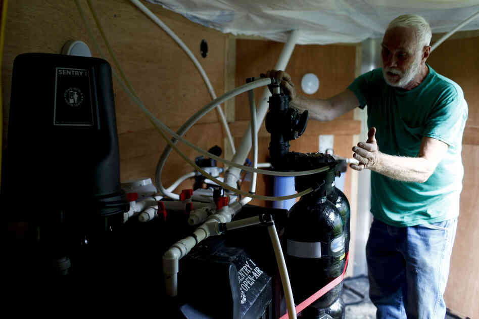 Chesapeake Energy outfitted a shed behind the Franklins' house with a water filtration system when their well started overflowing.