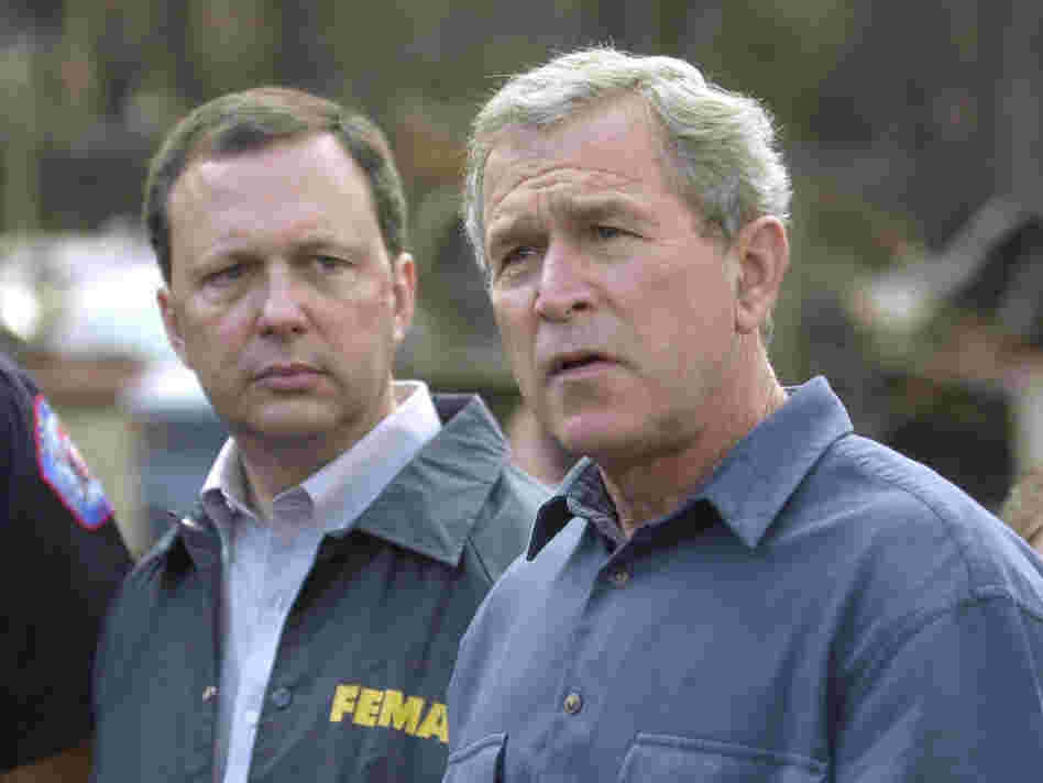 FEMA's Michael Brown (left) and President George W. Bush, seen in 2003, were widely criticized for their response after Hurricane Katrina devastated the Gulf Coast in 2005.